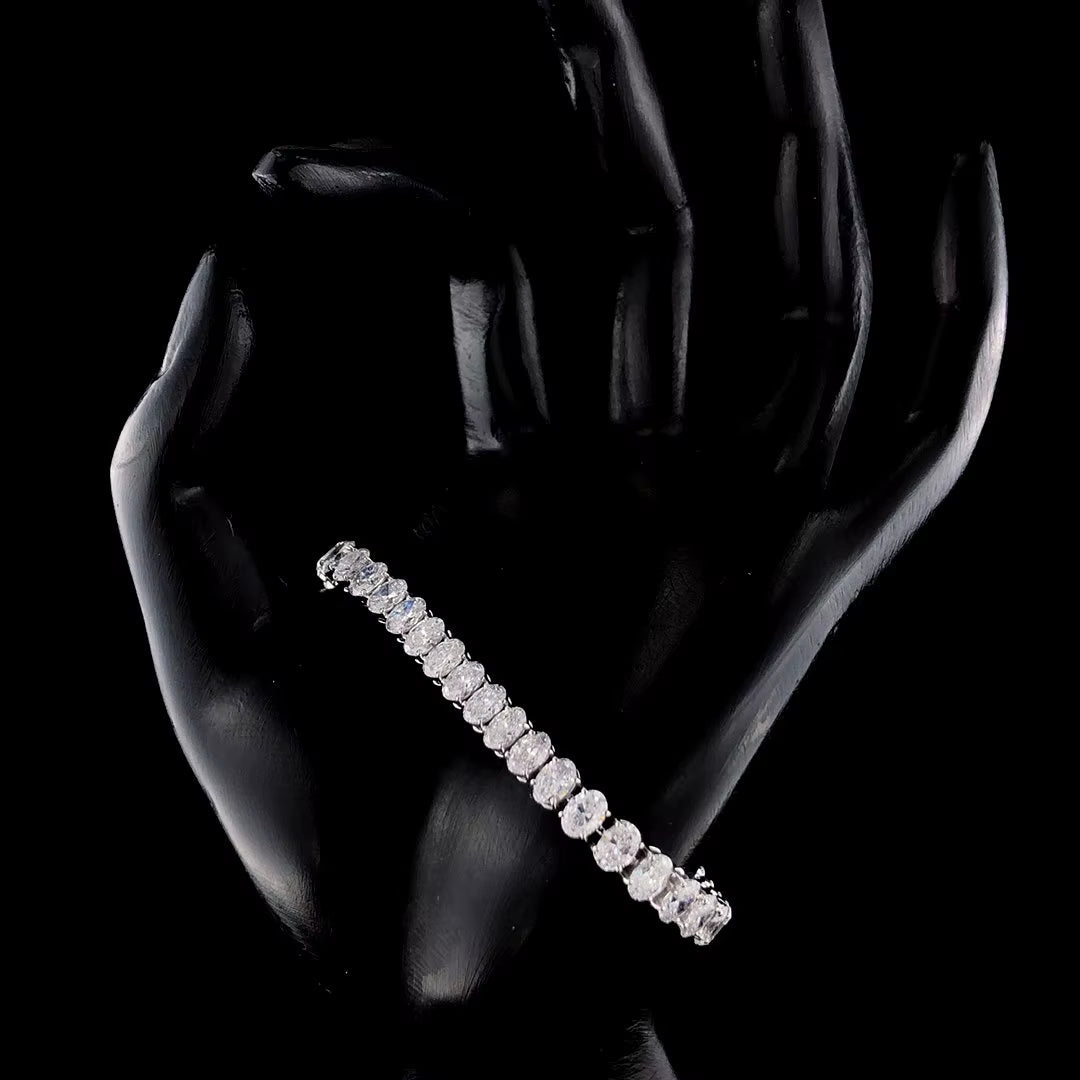 Ice Dazzle Custom Luxury Tennis Bracelet with VVX Lab Diamonds on a Artistic Hand Display with Luxurious black background 