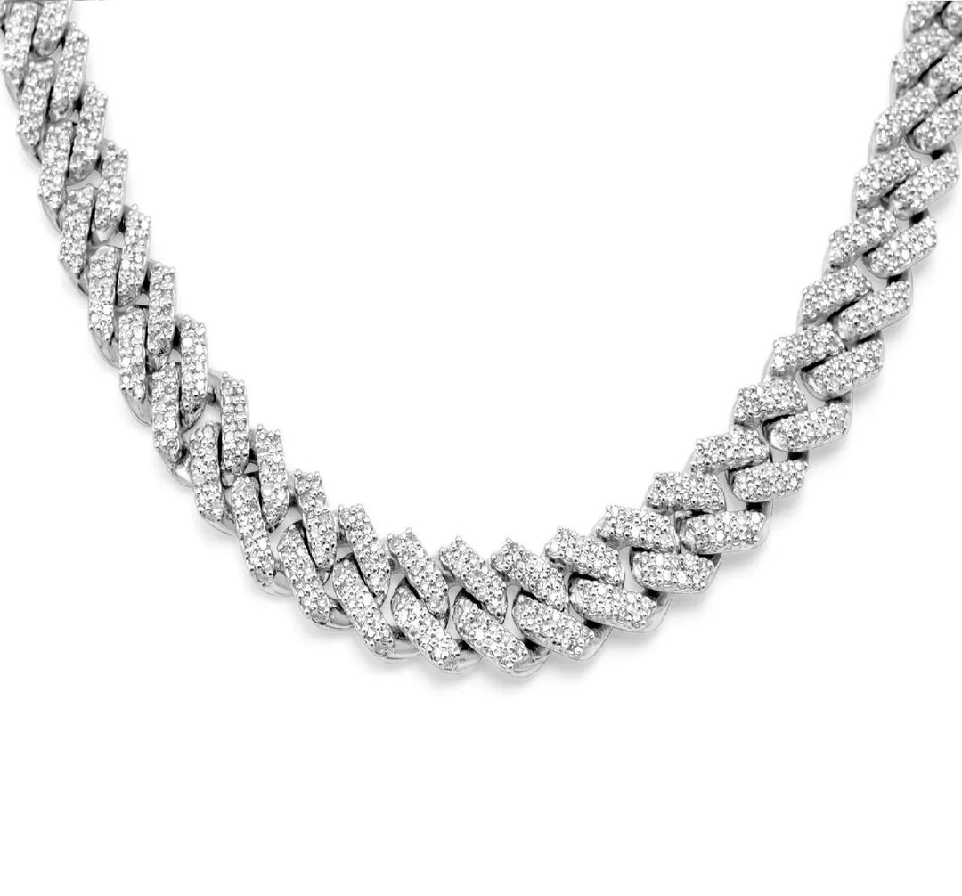 20mm one row cuban chain in white gold on a white background